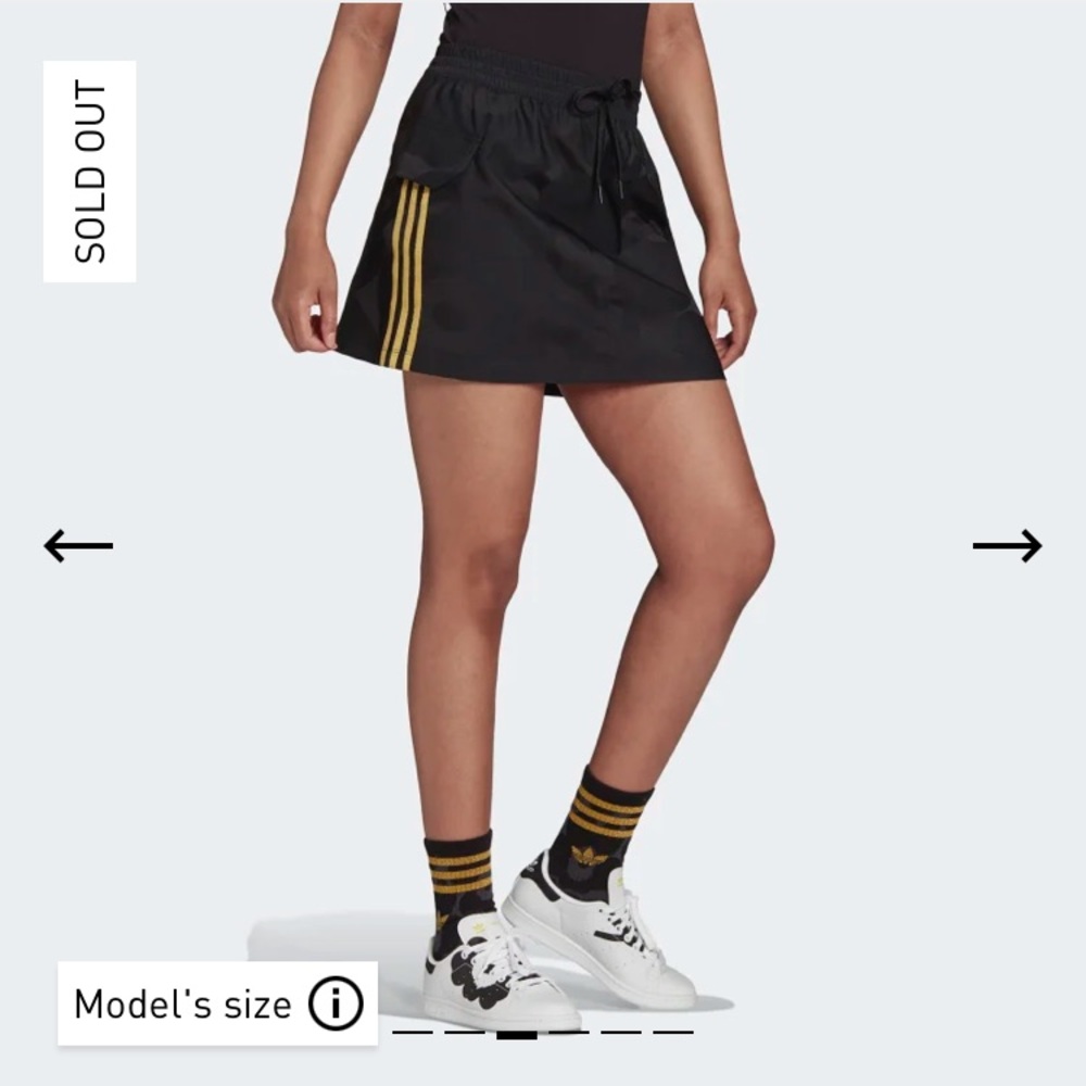 MARIMEKKO MINI CARGO SKIRT WITH GOLDEN STRIPES AND CARGO POCKETS